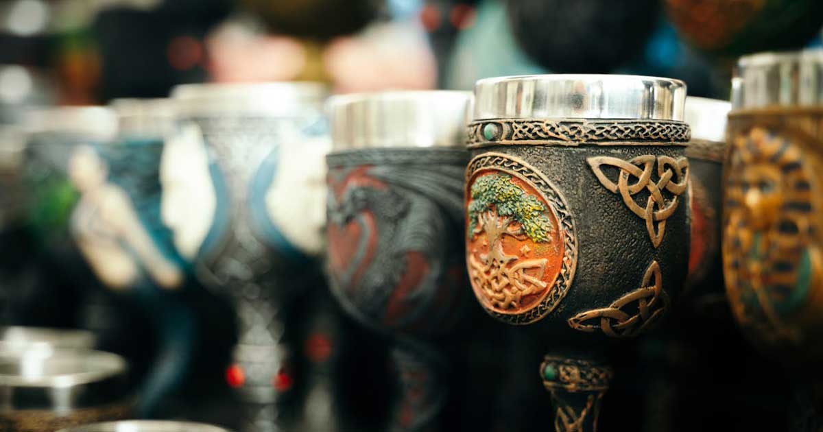 Celtic-style handcrafted cups with traditional knotwork and decorative detail