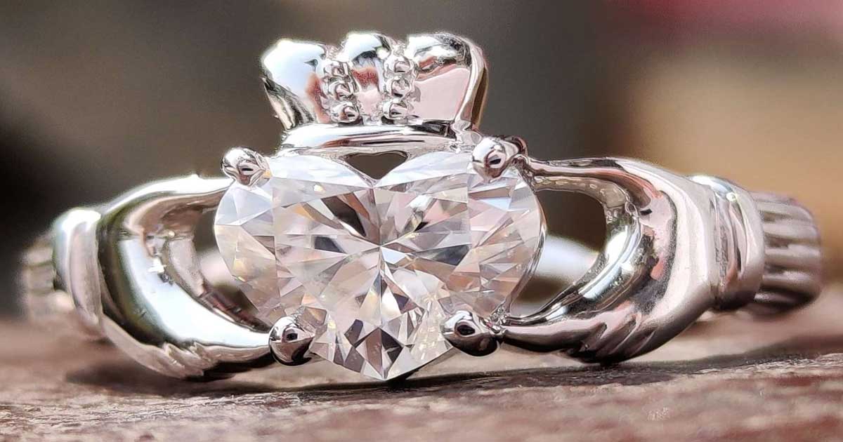 Claddagh ring with gemstone heart Irish symbol of love loyalty and friendship