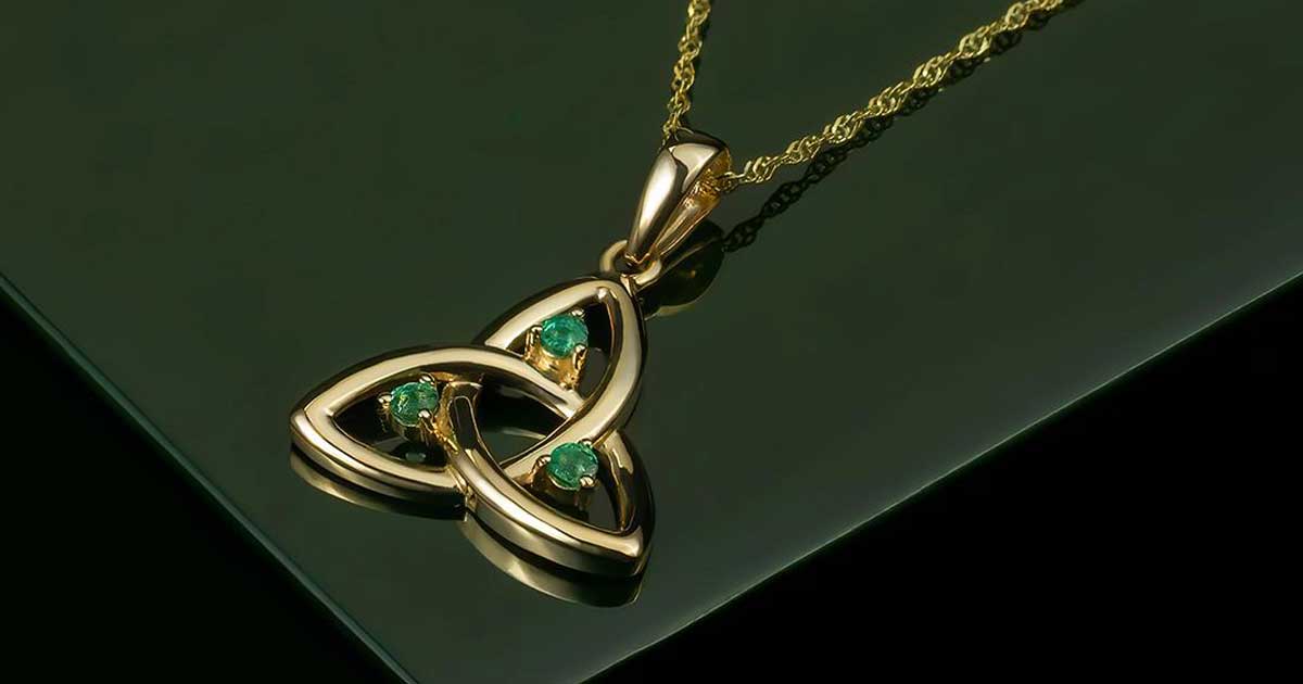 Emerald Trinity knot necklace in gold fine Irish jewelry