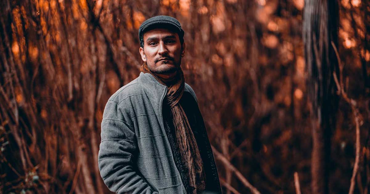 Irish outerwear jacket worn outdoors in cool woodland setting