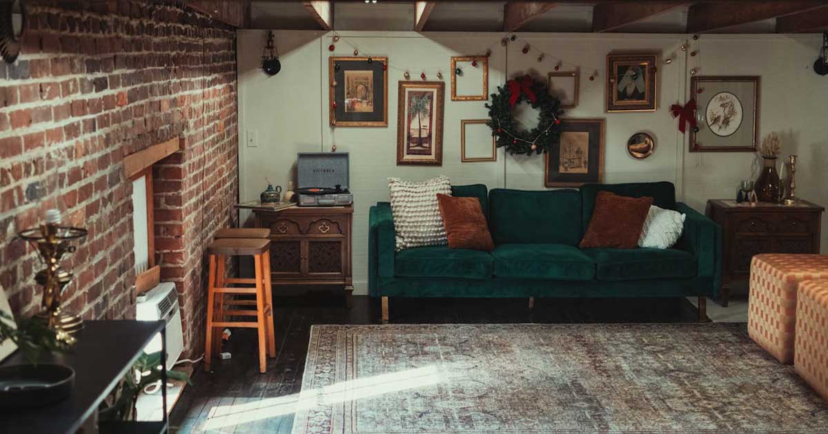 Irish-inspired wall decor with framed artwork, brick wall, and cozy living room setting